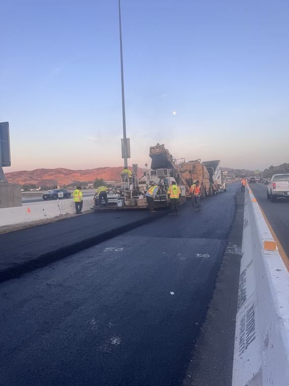 Freeway paving at sunrise